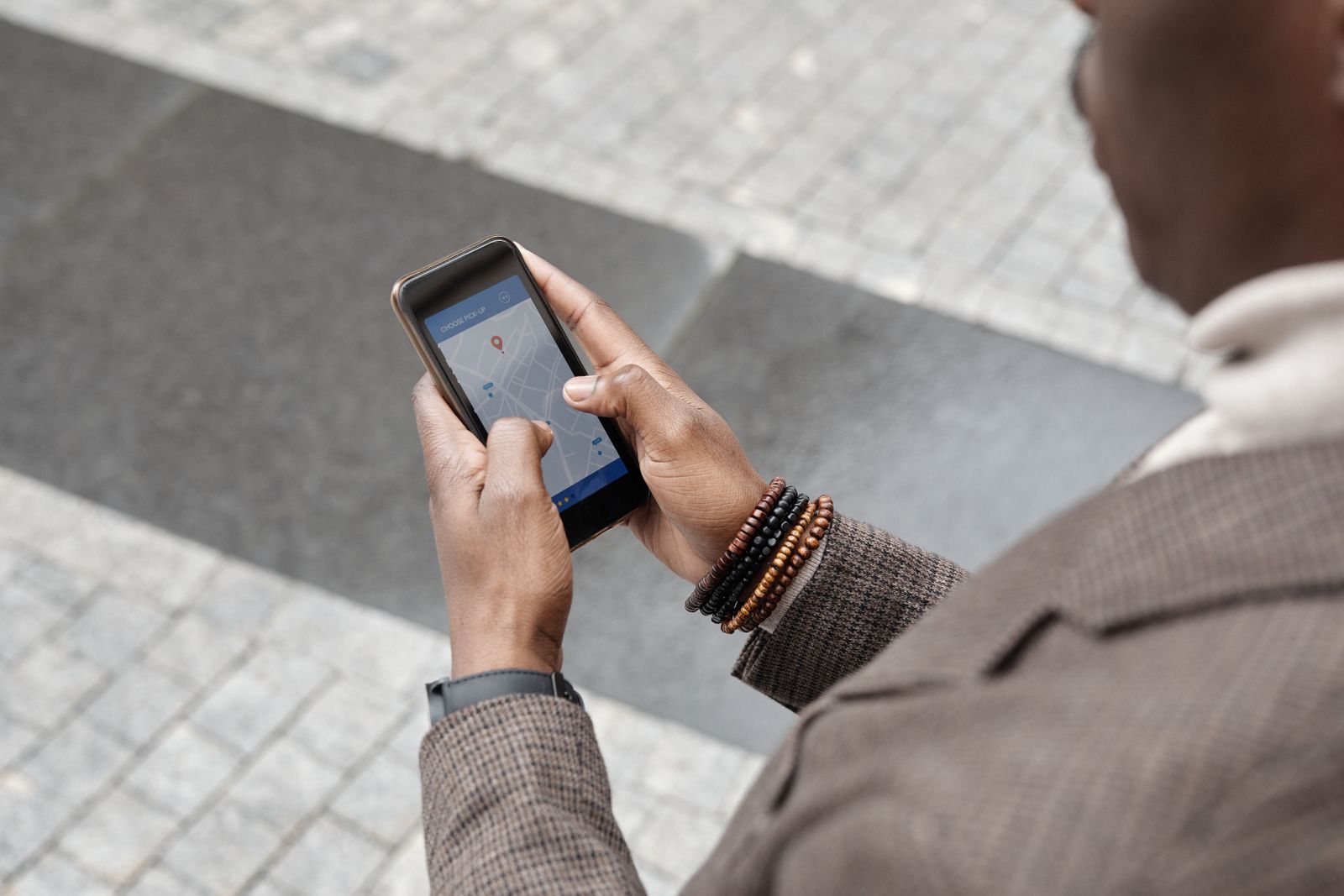 Patient searching on a phone for a nearby provider, where Google Business Profile for medical practices decides who appears